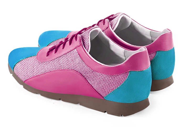 Turquoise blue and carnation pink women's open back shoes. Round toe. Flat rubber soles. Rear view - Florence KOOIJMAN
